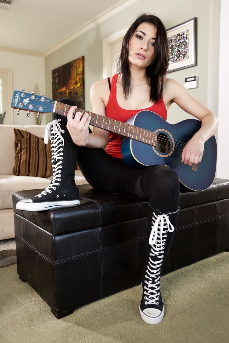 15P Asian rocker Raven Rockette gets totally naked while strumming a guitar