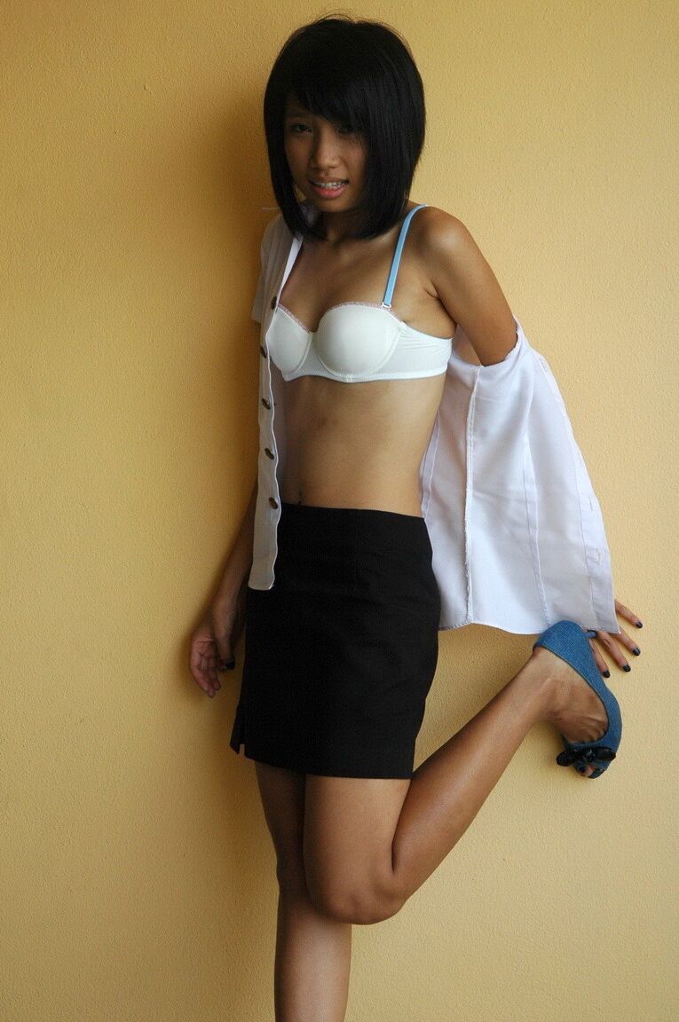 16P Young Asian girl smokes a cigarette before making her nude modeling debut