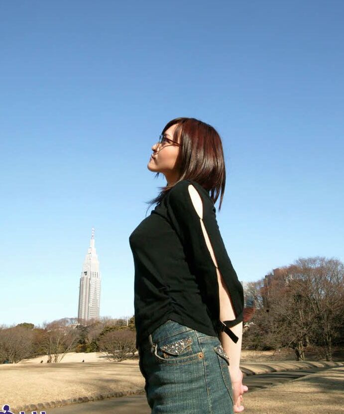 16P Tsukasa is a horny model who shows off her fine tits and ass as she is posing