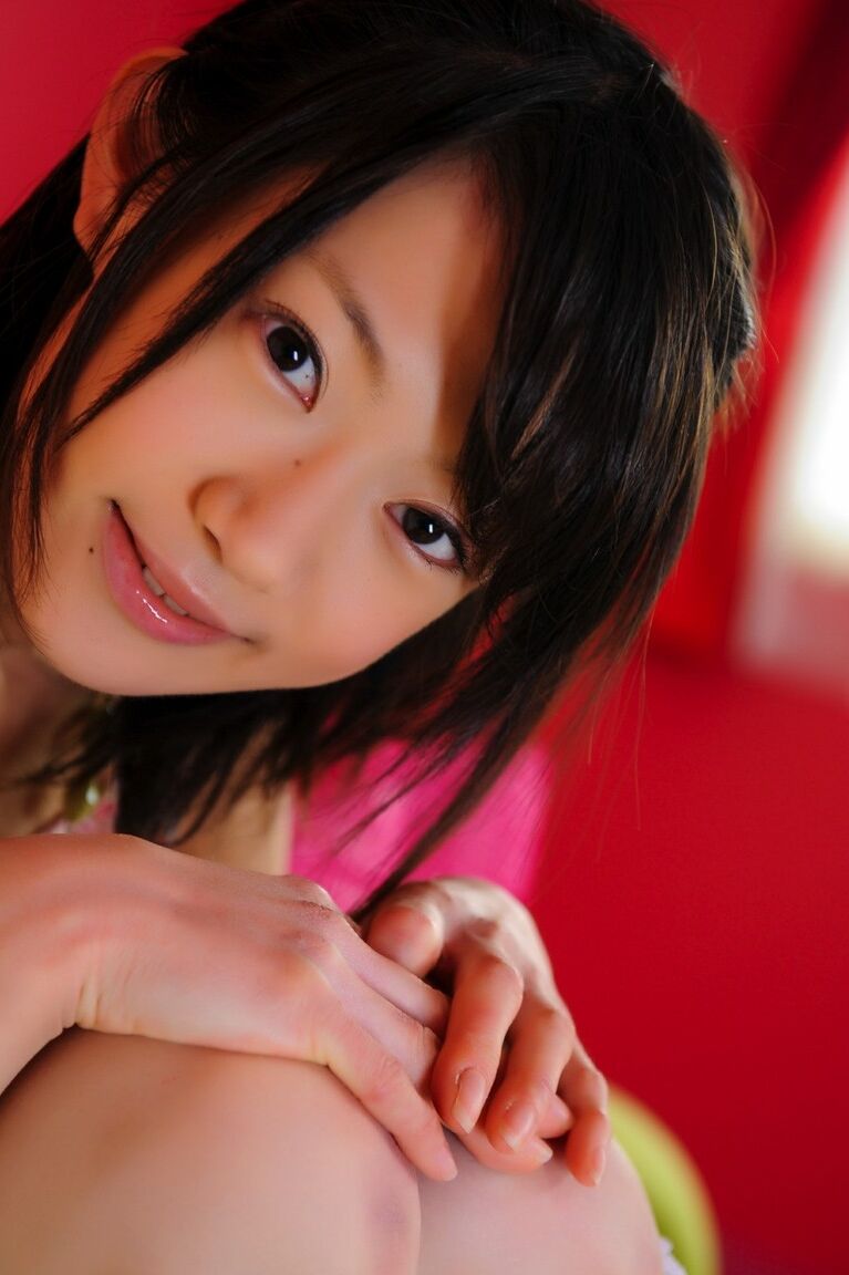 12P Petite Japanese girl with a pretty face models non nude in knee socks