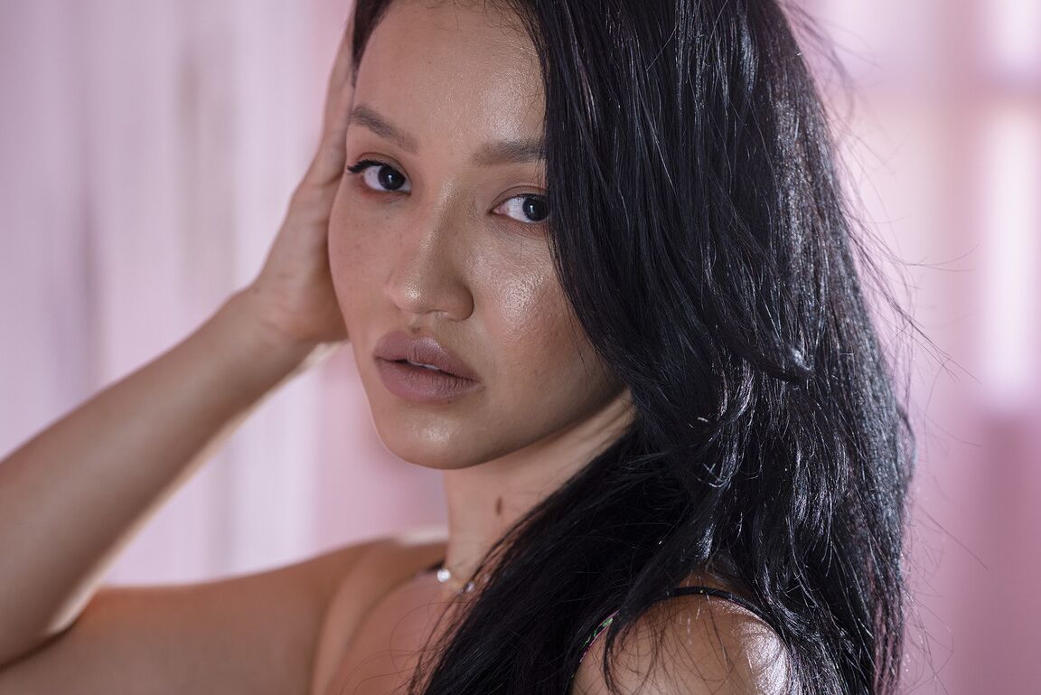 21P Asian babe Asia Vargas does a sultry striptease and spreads to show her beaver