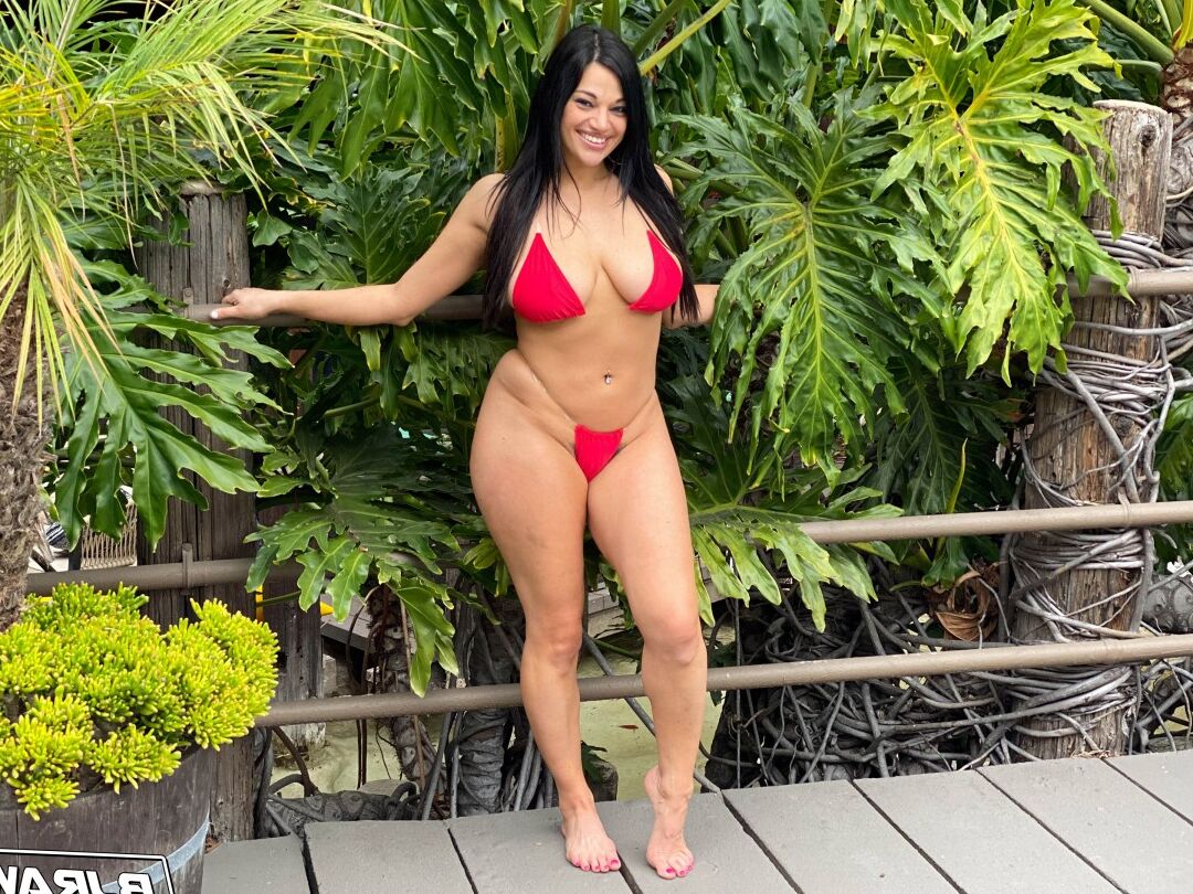 20P Curvy Latina chick Mona Azar models a bikini before an ass licking blowjob