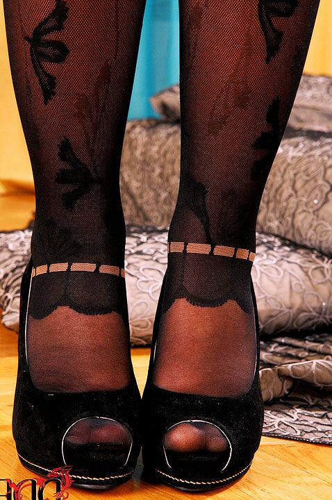 16P Leggy hose adorned babe baring nice ass while undressing for toying session