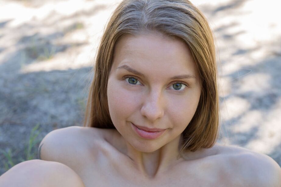 16P Nice young girl Ieva gets completely naked on an unpaved rural roadway