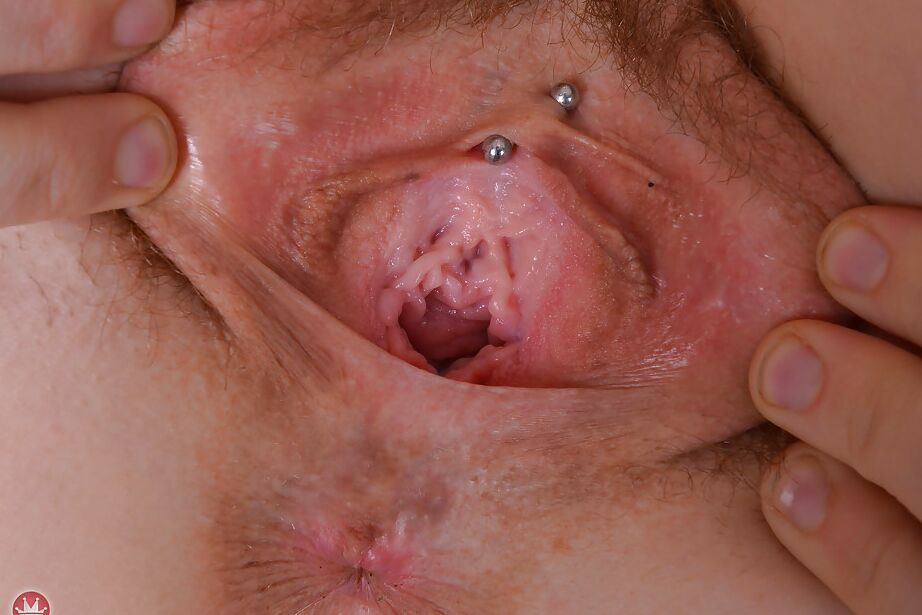 16P Clothed redhead babe Lily Cade undresses for spreading of hairy pussy