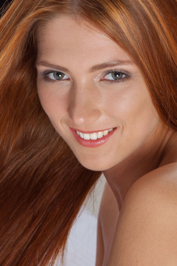 18P Pale redheaded teen Carinela offering closeups of shaved snatch