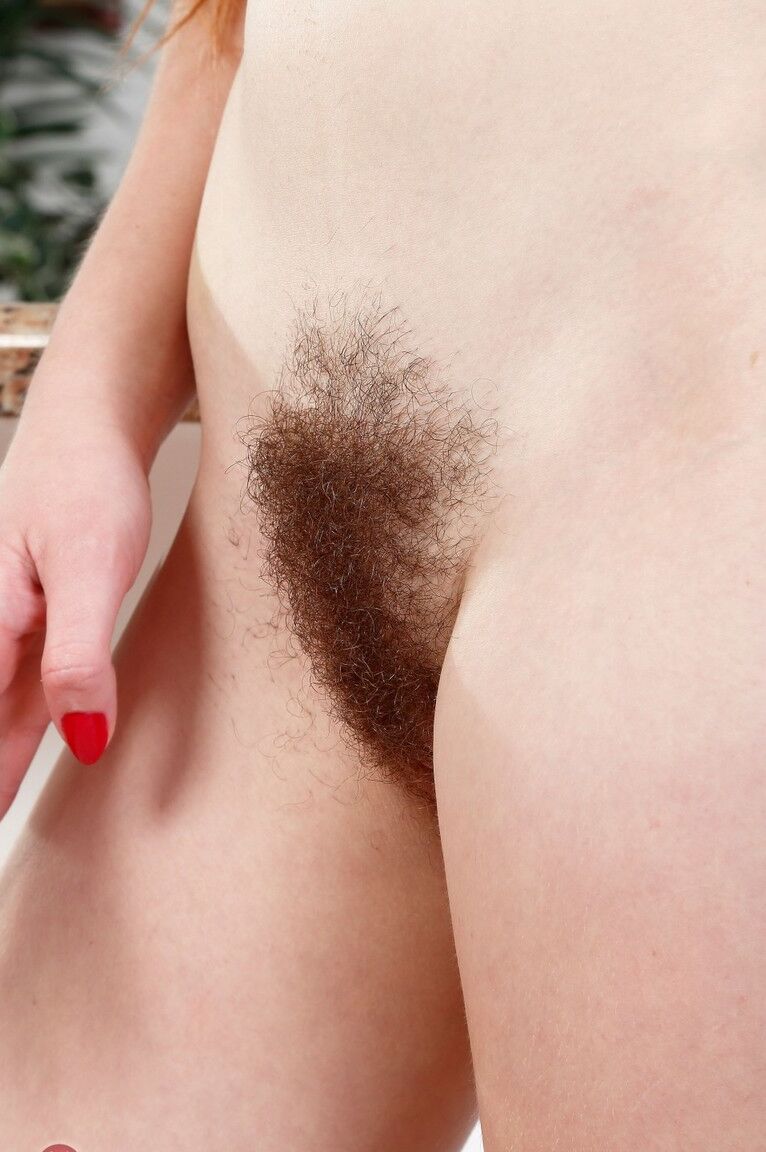 21P Kinky amateur Cassidy Bliss reveals her bushy twat and stretches it wide