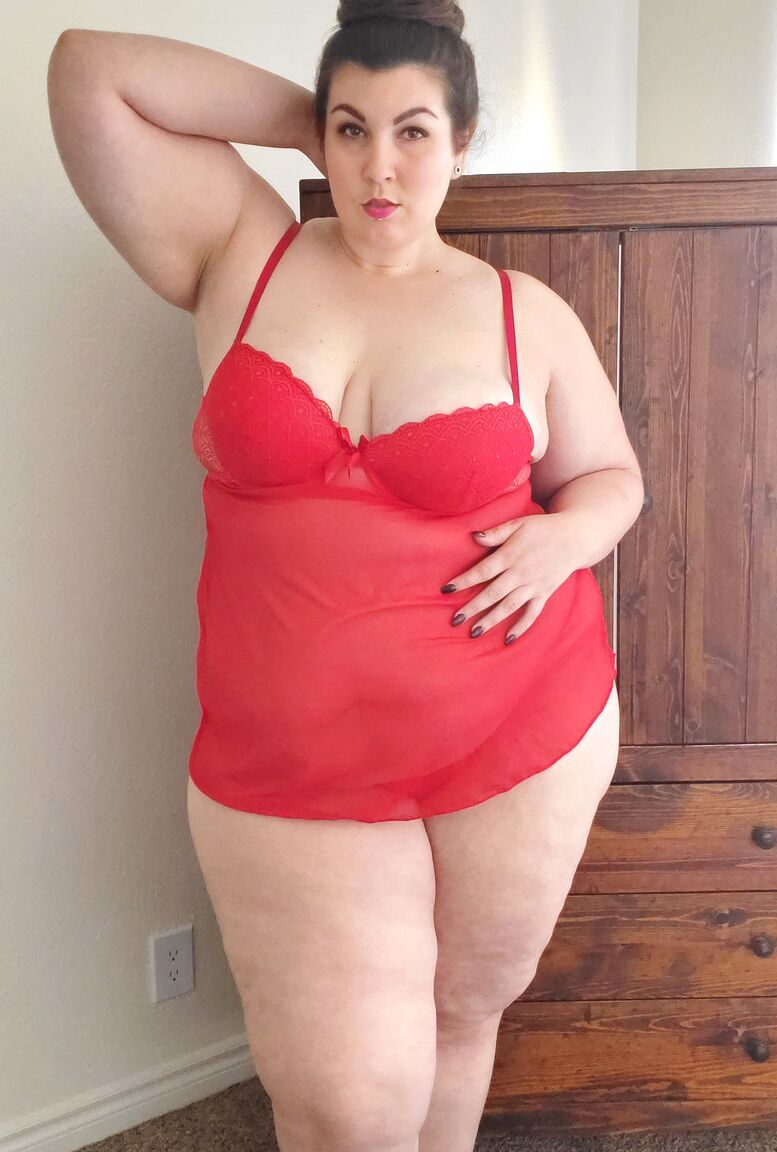 15P Fatty in a red negligee Lady Sublime flaunts her big juggs while sucking a toy