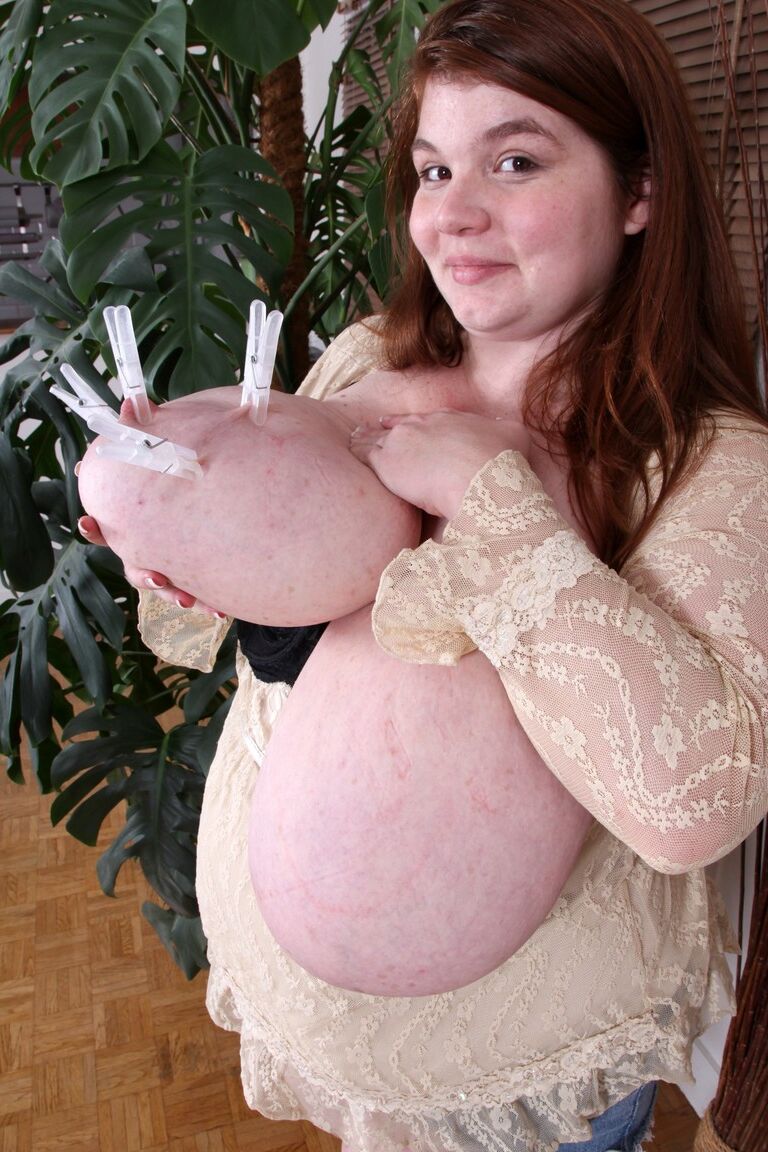 21P Fat amateur brunette Lexxxi Luxe oils up her giant melons and squeezes them