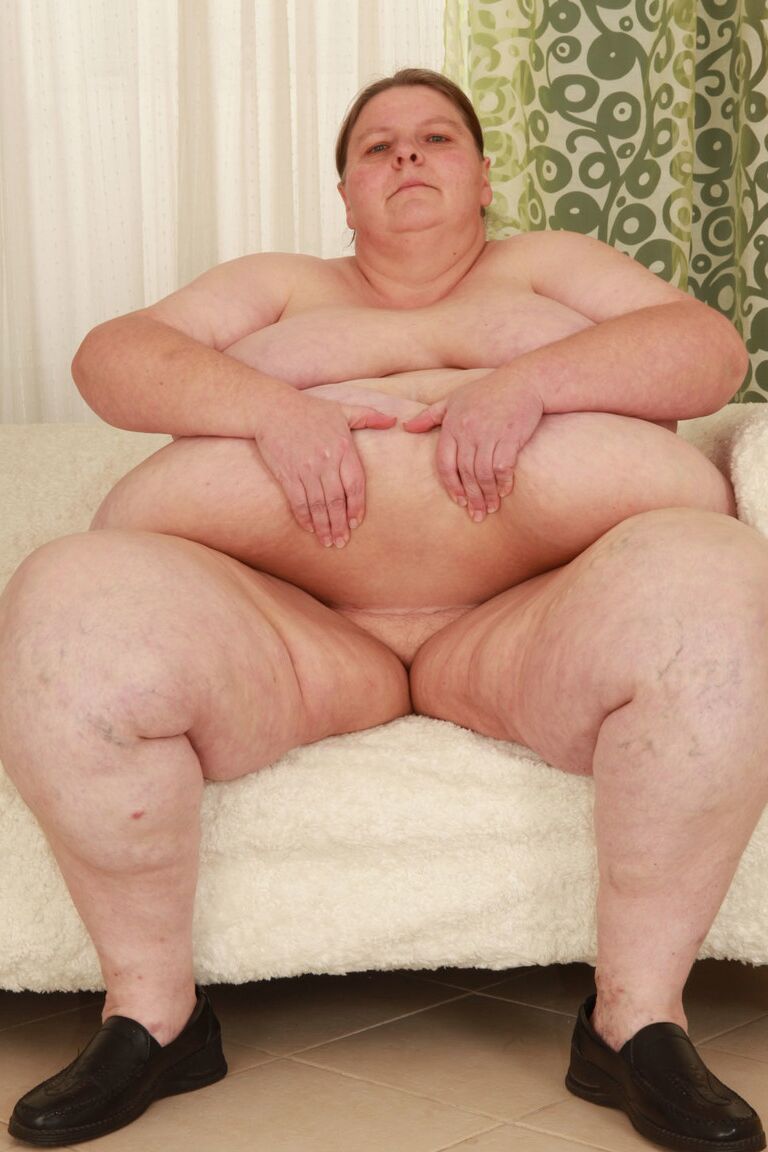 17P Massively obese lady Antonia C holds her floppy tits for a cumshot after a BJ