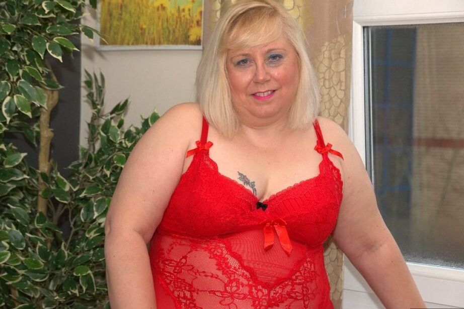 20P Fat blonde Lexie Cummings fondles her pierced cunt in red lingerie and hosiery