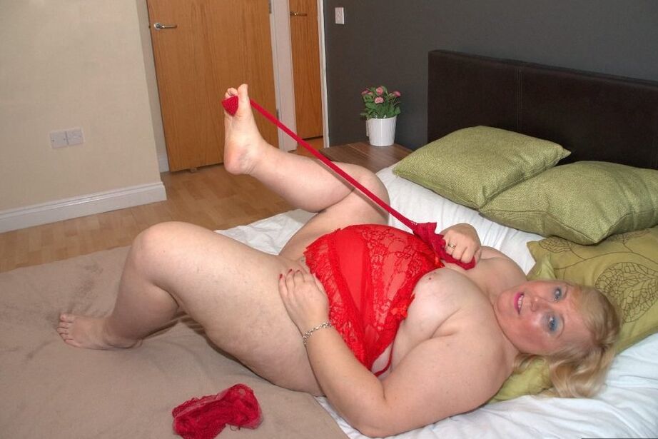 20P Fat blonde Lexie Cummings fondles her pierced cunt in red lingerie and hosiery