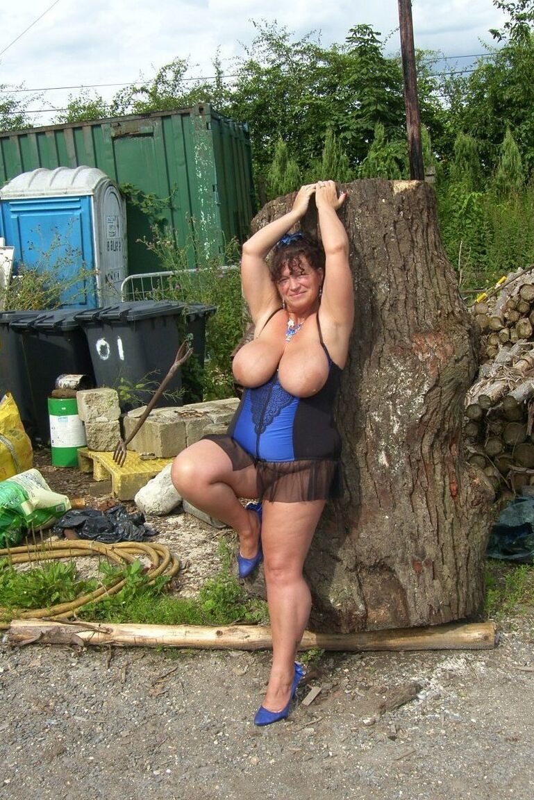 21P Amateur fat aunty Kim reveals her huge melons and gets chained to a tree