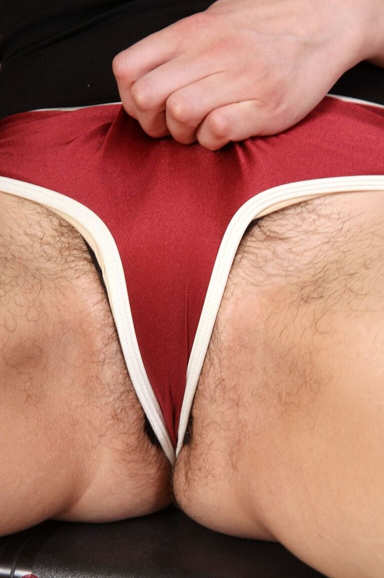 17P Dark haired plumper Ruby Roxx exposes her hairy ass and twat in knee socks