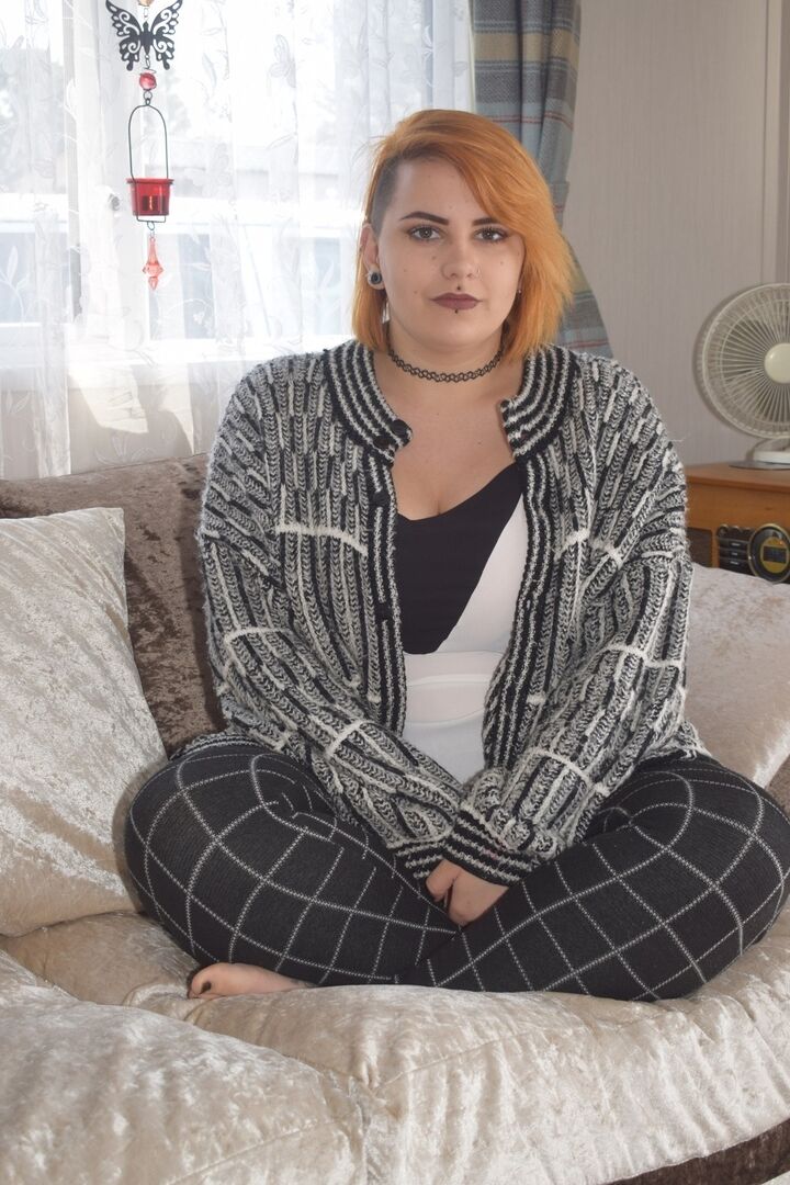 20P Fat redhead Phillipas Ladies stands naked after disrobing on a couch
