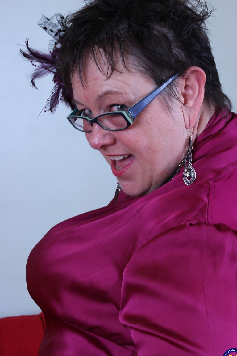 21P Short haired BBW Honey unleashing her big breasts & showing her mature snatch