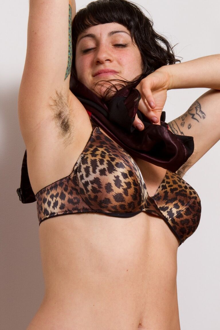 17P Black haired temptress Stacey Stax reveals hairy armpits & displays furry twat
