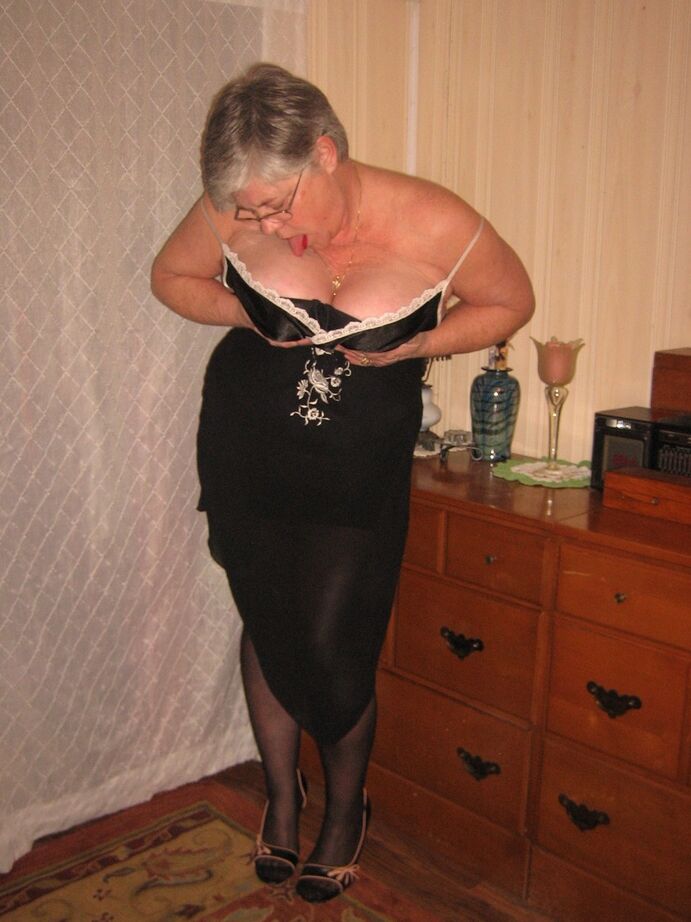 20P Overweight nan Girdle Goddess strips to her footwear in front of a dresser