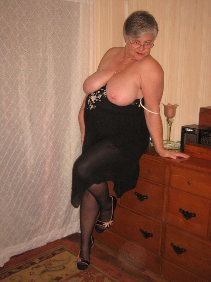 20P Overweight nan Girdle Goddess strips to her footwear in front of a dresser