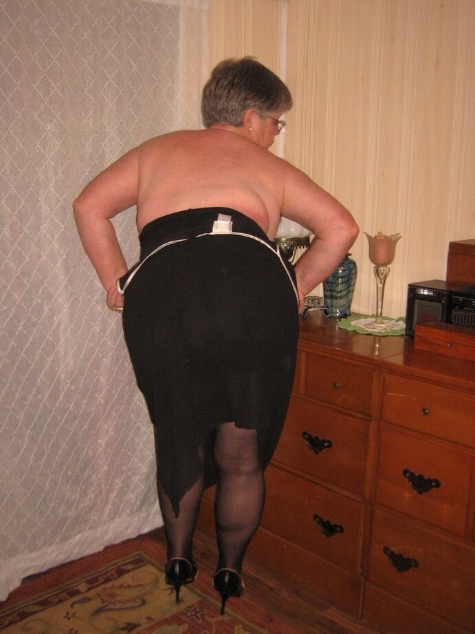 20P Overweight nan Girdle Goddess strips to her footwear in front of a dresser