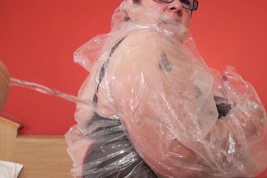20P Fat older lady masturbates with a toy before donning a raincoat in lingerie