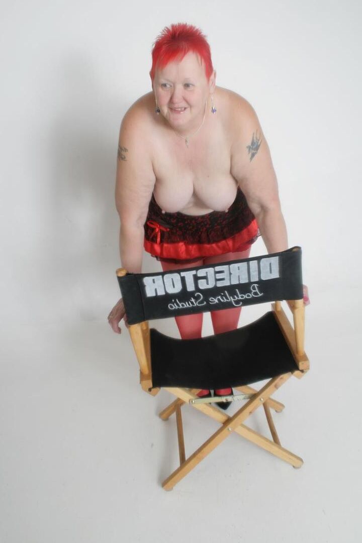 20P Obese redhead Valgasmic Exposed shows her goods while sporting short hair
