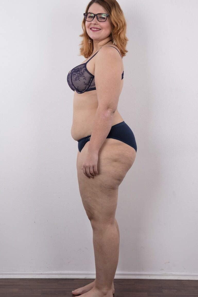 20P Amateur fatty Karolina shows her flab in the nude wit her glasses on