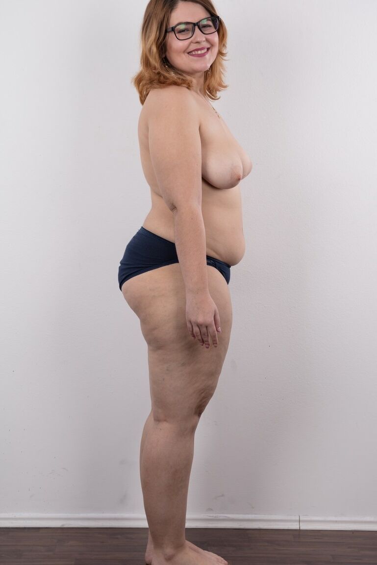 20P Amateur fatty Karolina shows her flab in the nude wit her glasses on