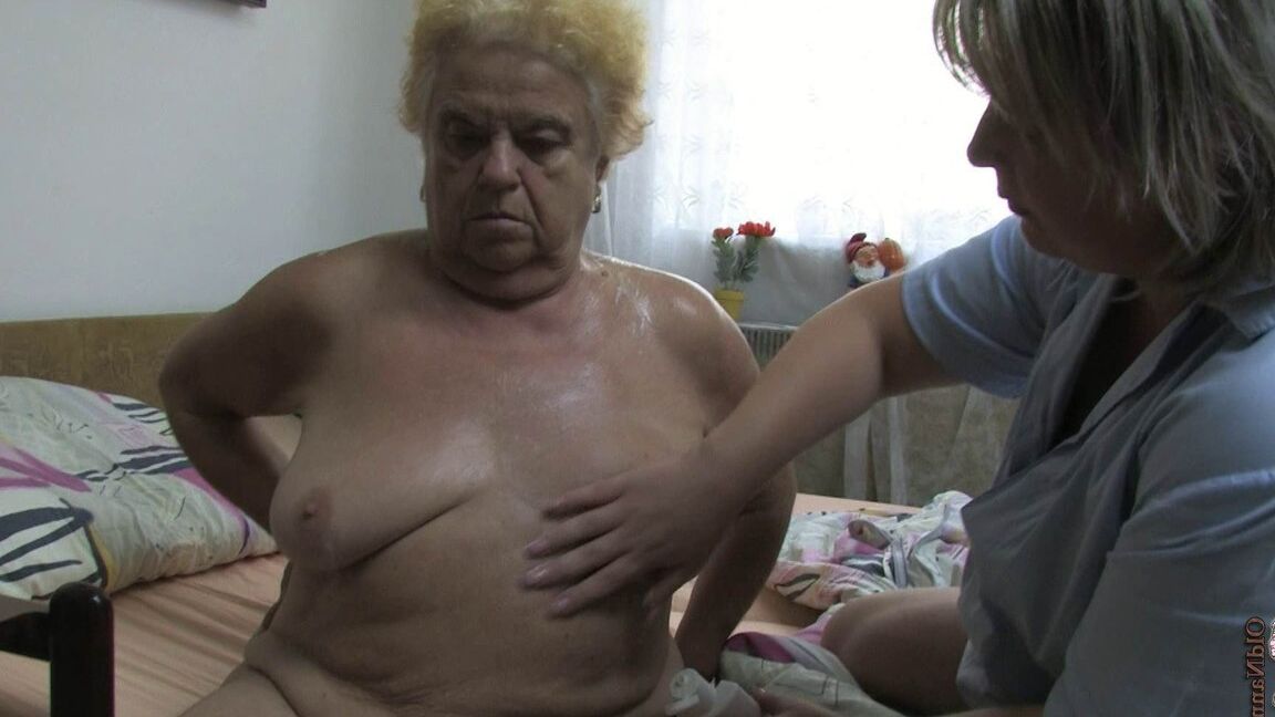 21P Big titted matures Krystyna and Julia play with a sex toy on a bed