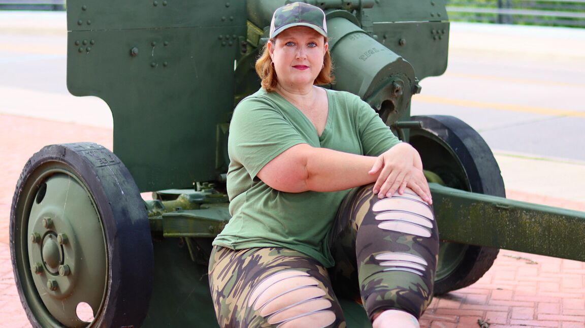 12P Obese amateur Goddess Pear models for a SFW shoot on an artillery gun in camo