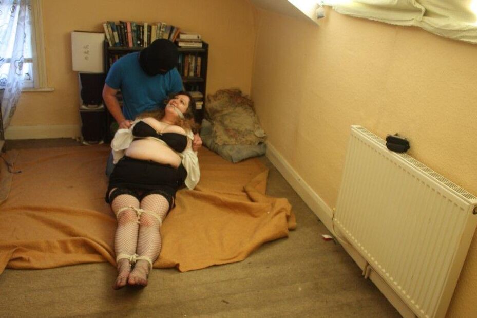 16P Fat woman is rendered helpless by the maintenance man before being tied up