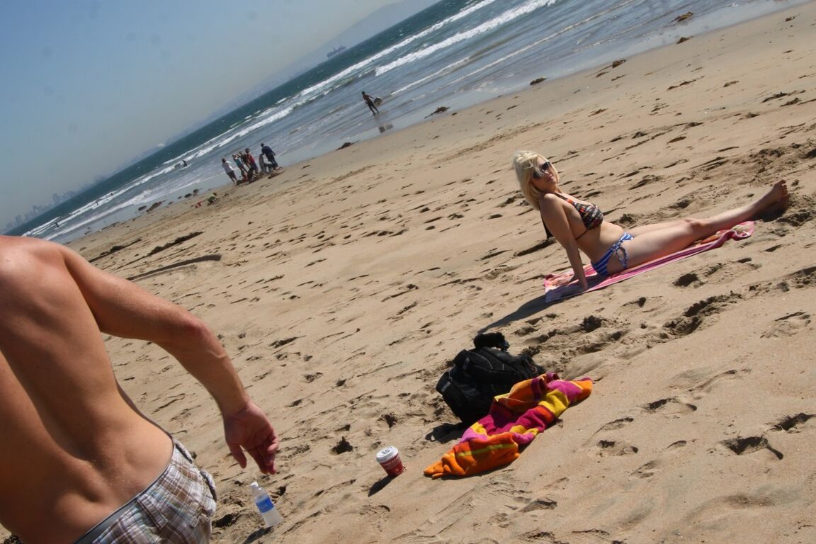 16P Chubby blonde sunbather Siri flaunts her big tits in a bikini on the beach