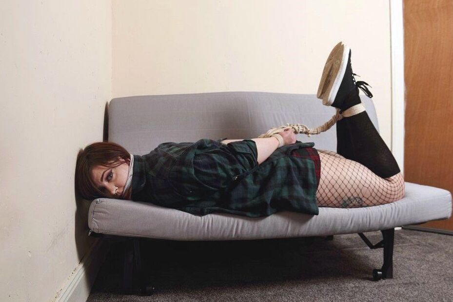 16P Natural redhead Luna La Roux is cleave gagged and hogtied while dressed