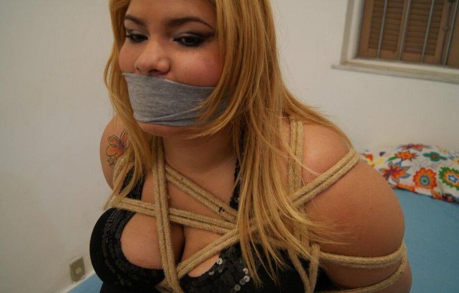 16P Strawberry blonde plumper is tied up with rope while cleave gagged