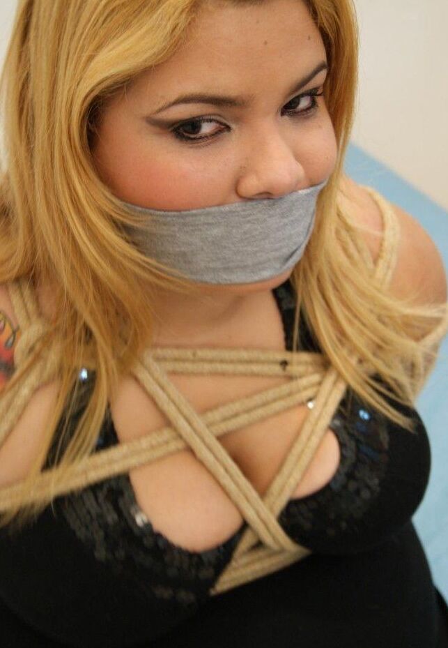16P Strawberry blonde plumper is tied up with rope while cleave gagged