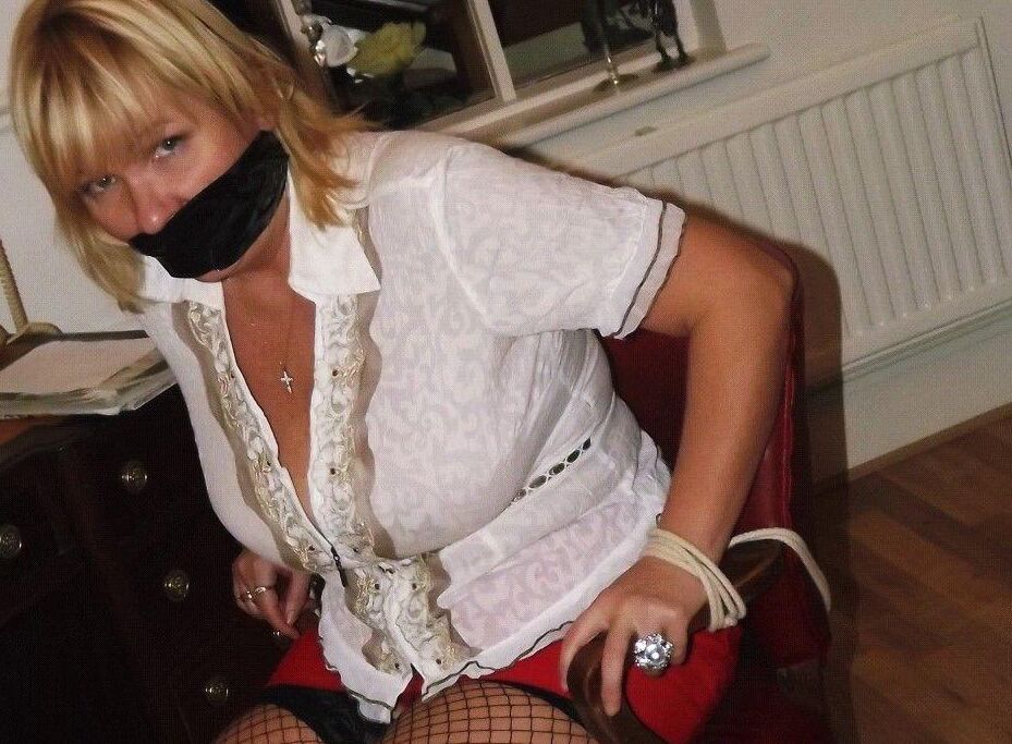 16P Older blonde with big boobs finds herself cuffed, blindfolded and tied up too