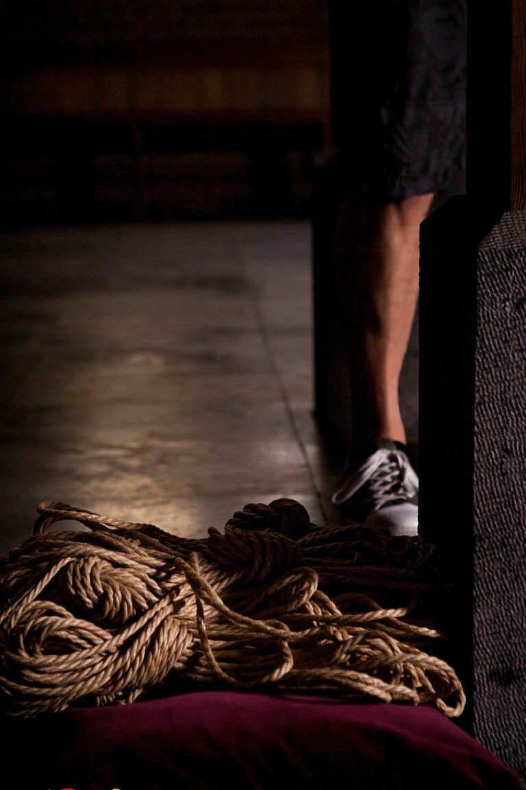 16P Naked British woman Sarah Calanthe is affixed to a wooden post with rope
