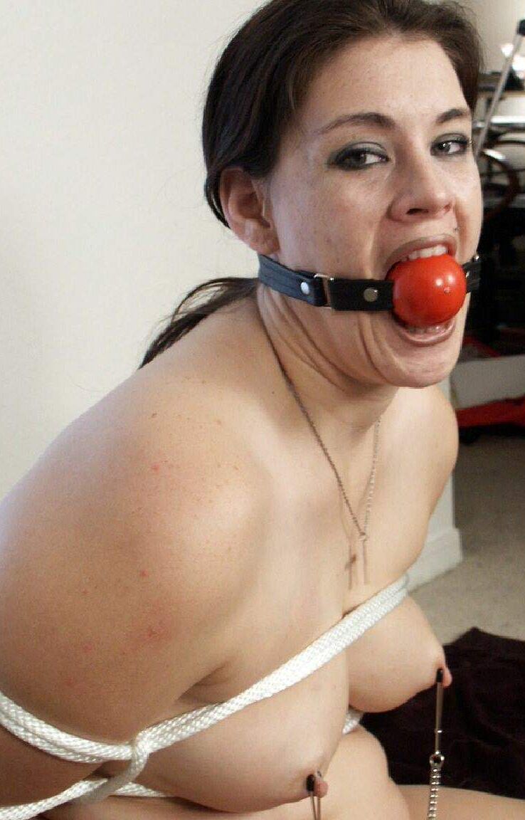 10P Chubby female sports a ball gag and nipple clamps while tied up in her panties