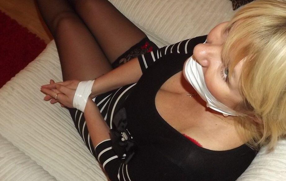 16P Fat older blonde displays her large tits while tied up and cleave gagged