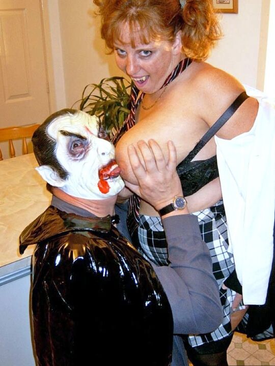 20P UK redhead Curvy Claire blows a man that is dressed as Dracula for Halloween
