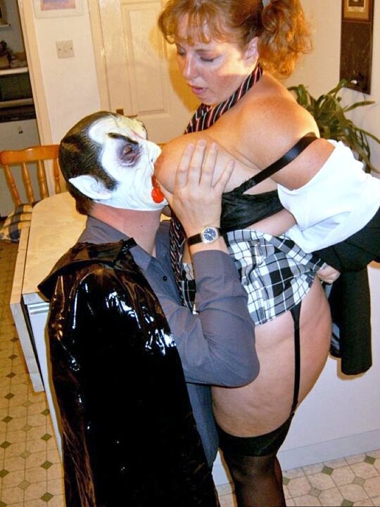 20P UK redhead Curvy Claire blows a man that is dressed as Dracula for Halloween