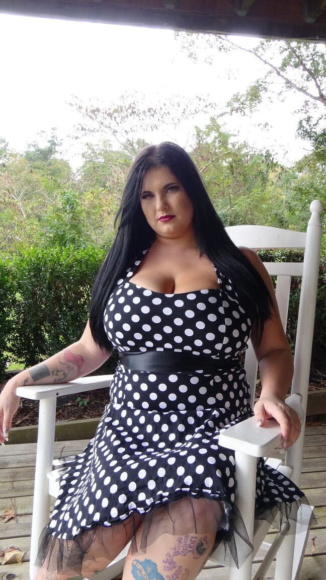 15P Dark haired chubby model Mischievous Kitty flashes her undies in a solo