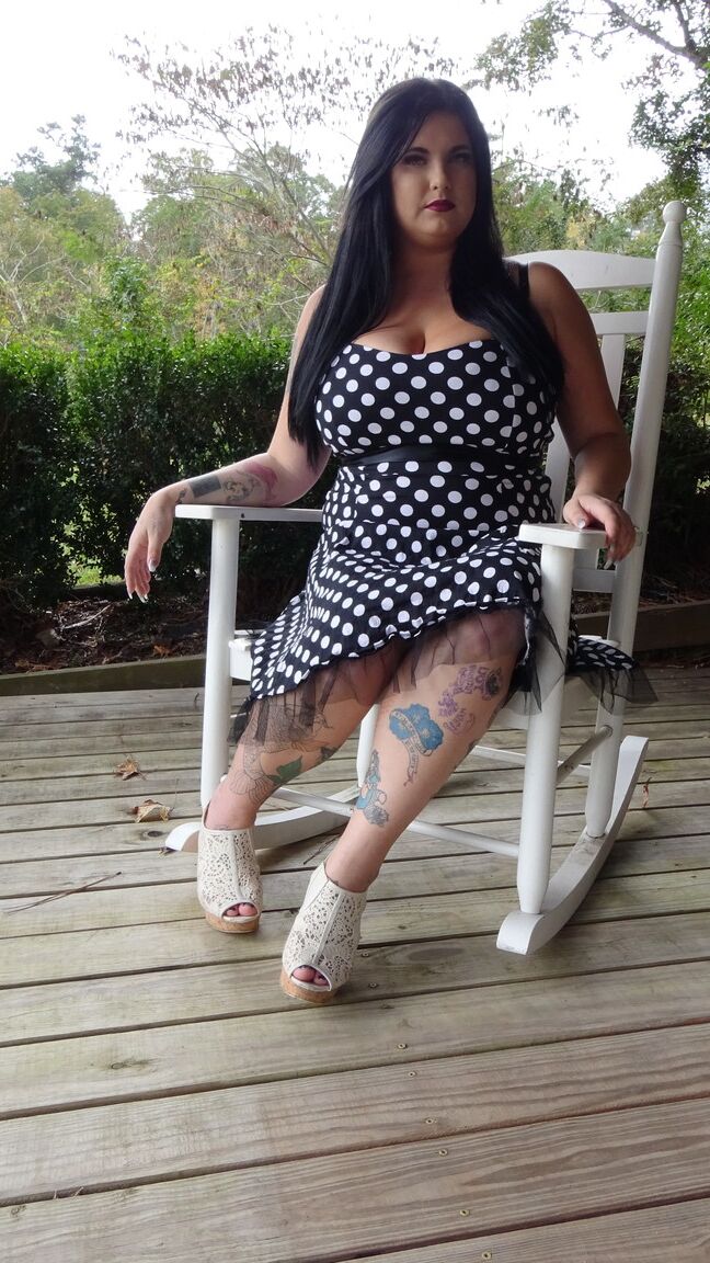 15P Dark haired chubby model Mischievous Kitty flashes her undies in a solo