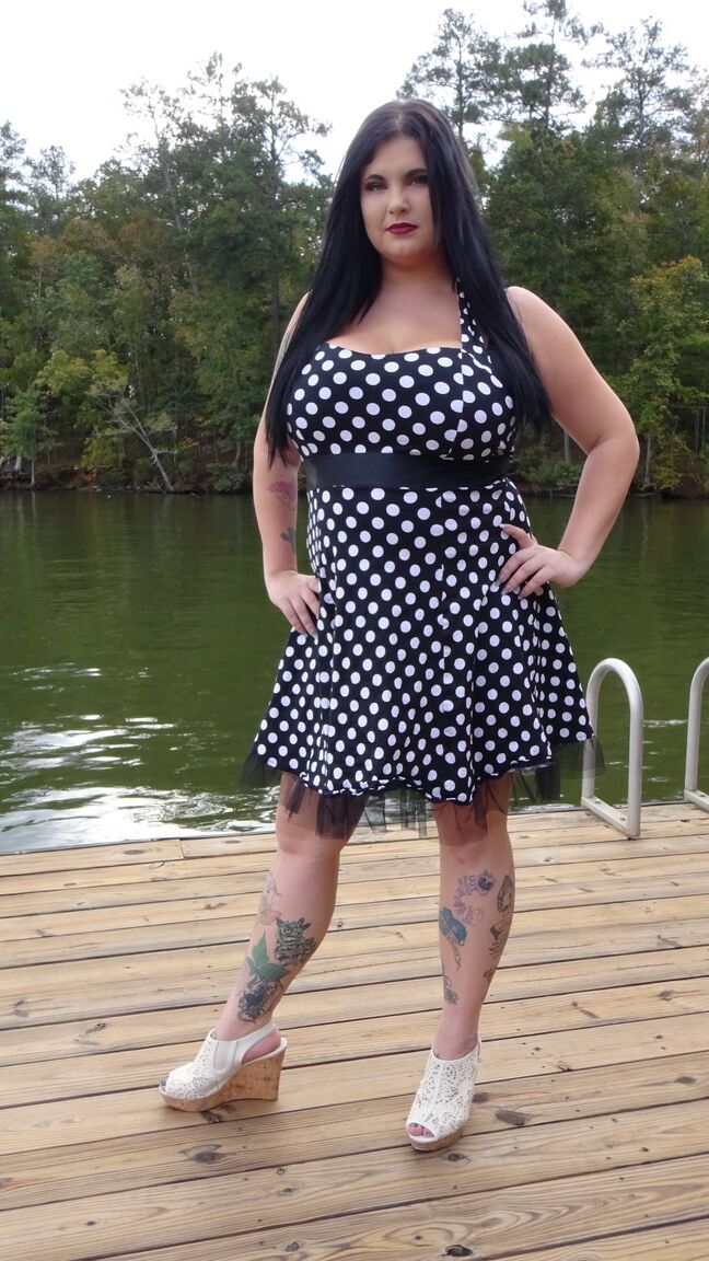15P Dark haired chubby model Mischievous Kitty flashes her undies in a solo