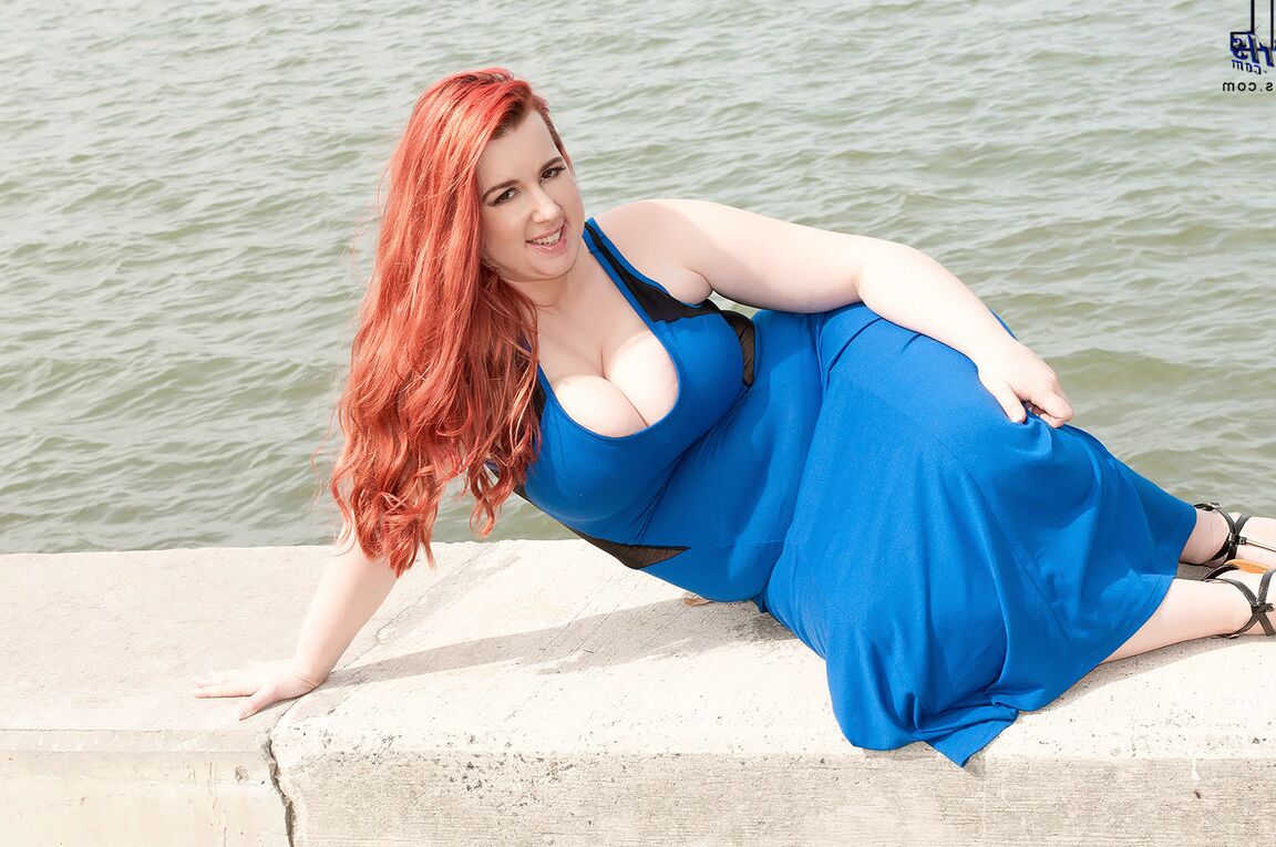 16P Redhead BBW Amerie Thomas runs water over her big tits after modeling a dress