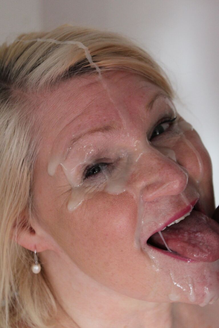 21P Blonde granny with big tits Lacey Starr blows a BBC before getting rammed