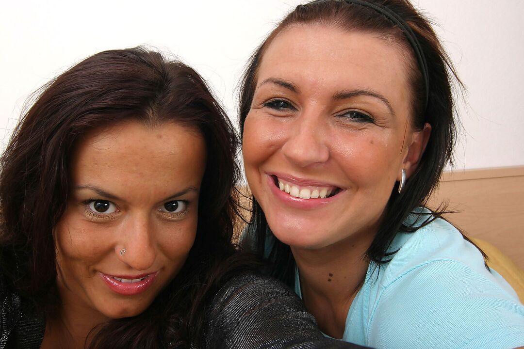 15P Kora Kryk & Aneta Buena cover their huge boobs with yogurt on a bed