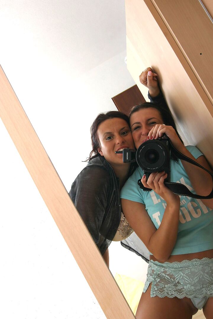 15P Kora Kryk & Aneta Buena cover their huge boobs with yogurt on a bed