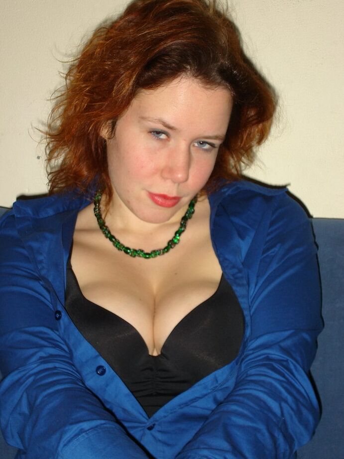 20P Redheaded amateur works a butt plug into her anal cavity in hosiery