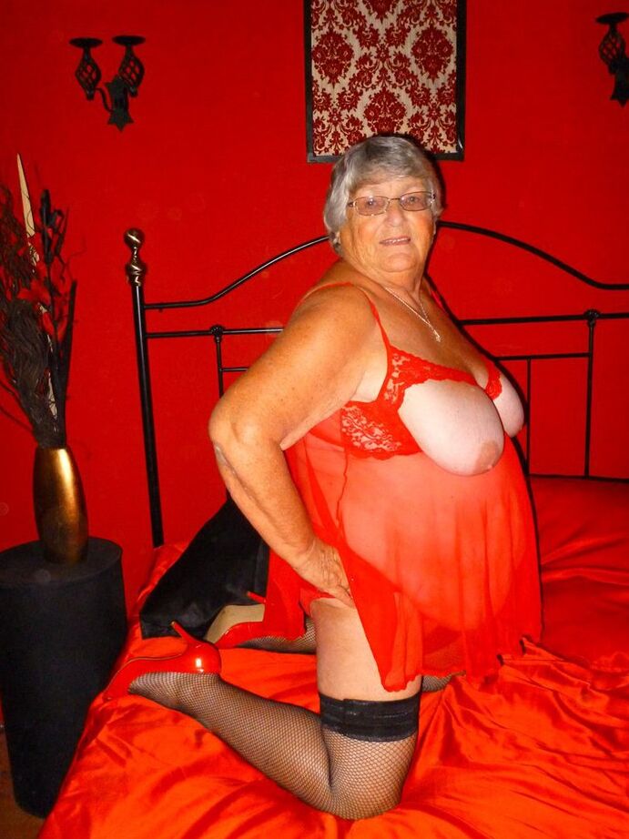 20P Obese nan Grandma Libby dildos her freshly shaved vagina on a bed